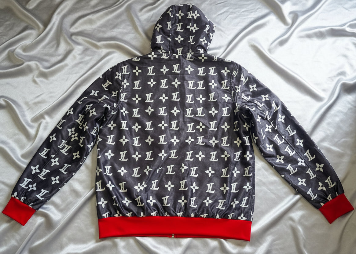 Velour Hoodie with Louis Vuitton pattern flat layed on a gray silk fabric
