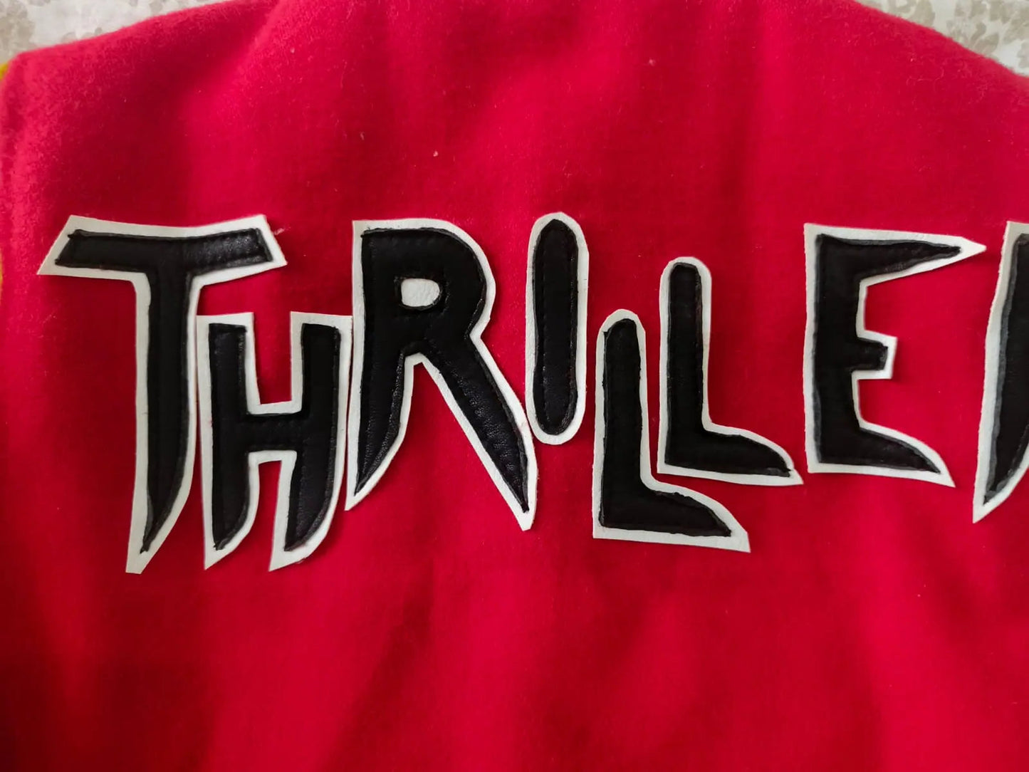 Red towel with black text on a red background