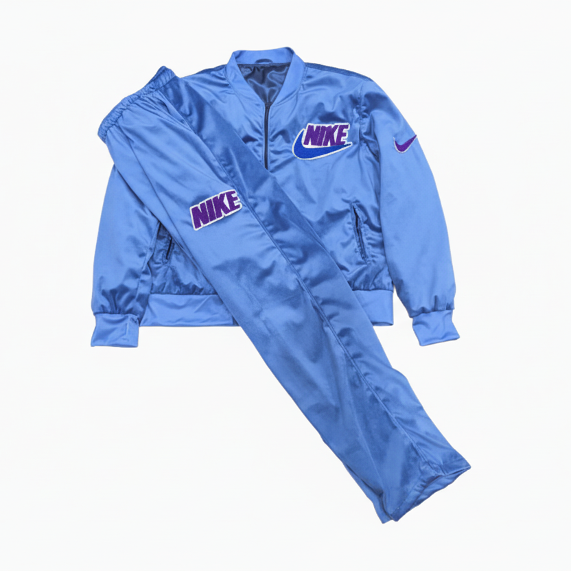Blue Nike tracksuit with brand logo on a white background