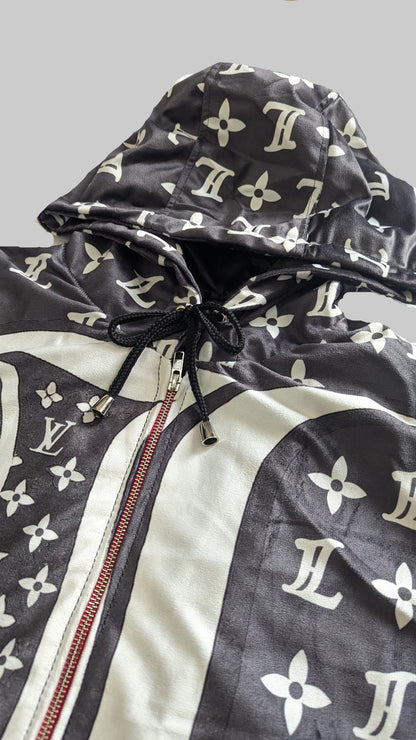Louis Vuitton jacket with monogram pattern on a white surface