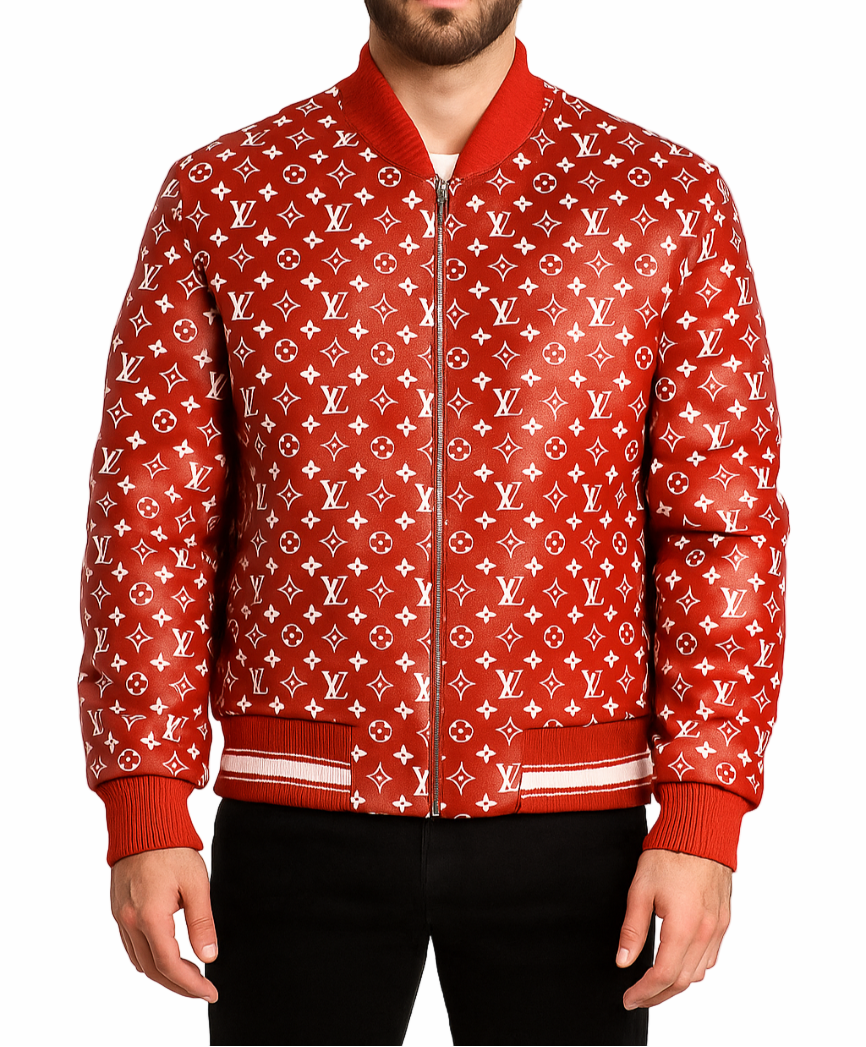 Man wearing a red bomber jacket with white Louis Vuitton monogram pattern on a white background
