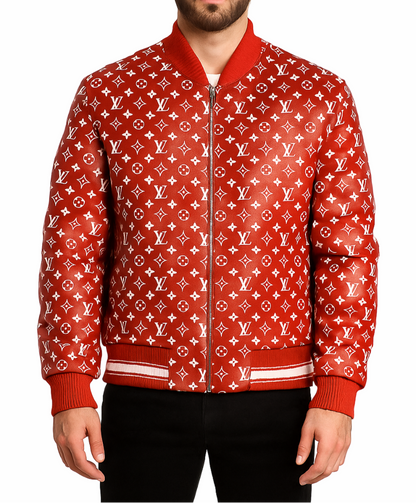 Man wearing a red bomber jacket with white Louis Vuitton monogram pattern on a white background