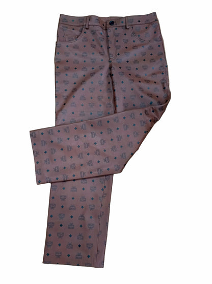 MCM Monogram Leather Pants flat lay front pocket details on white background