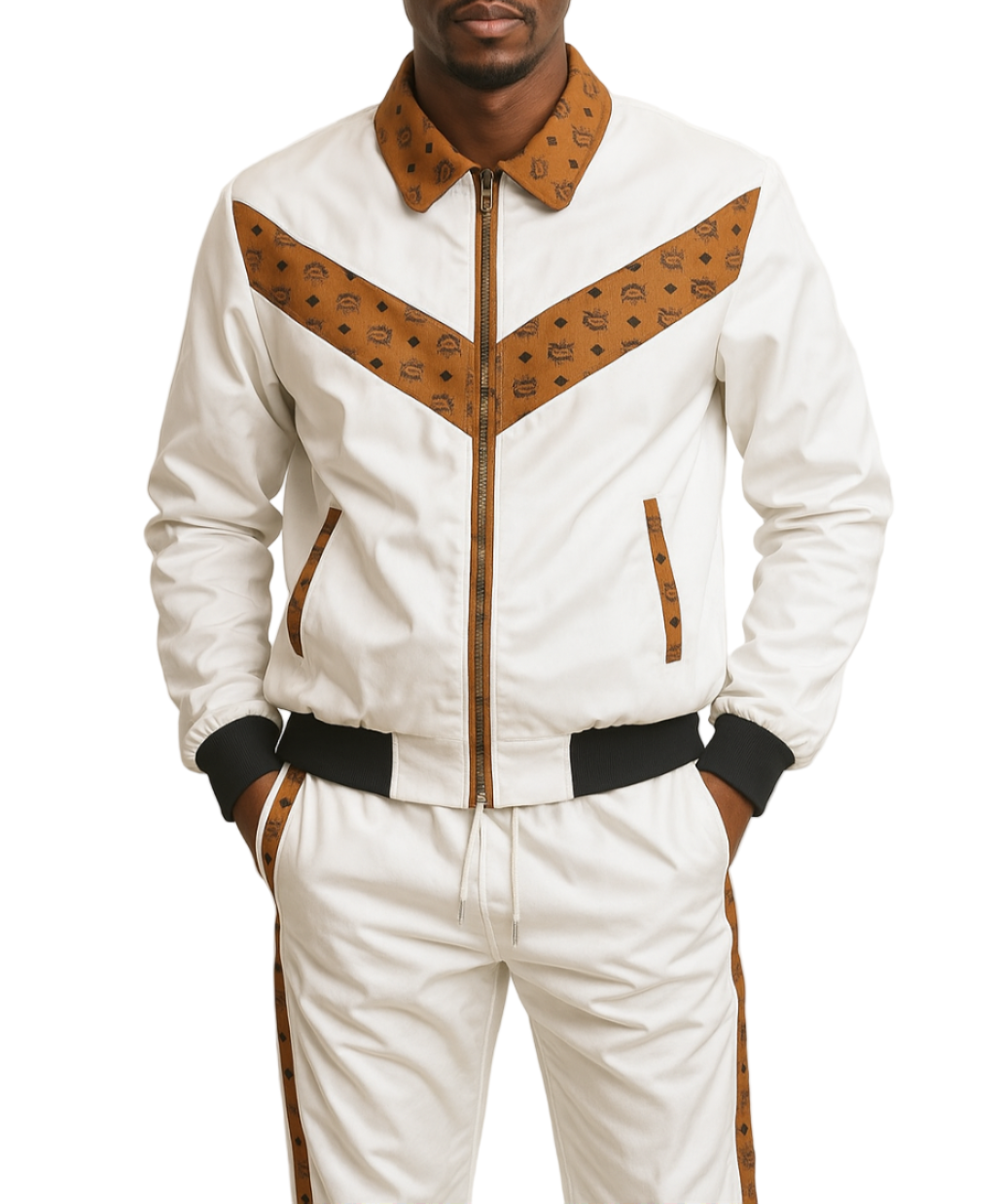 Man wearing a MCM white and brown tracksuit on a plain background