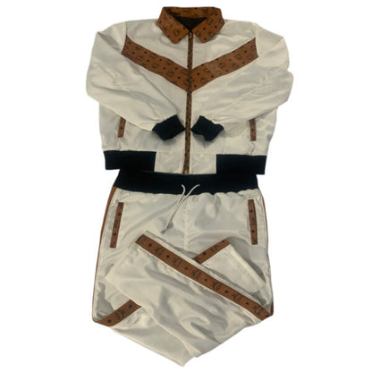 Mens MCM white and brown tracksuit on a plain background