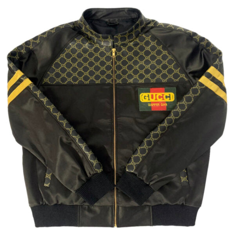 Black Bomber Leather Jacket with GG patterned accents and Gucci logo on a white background