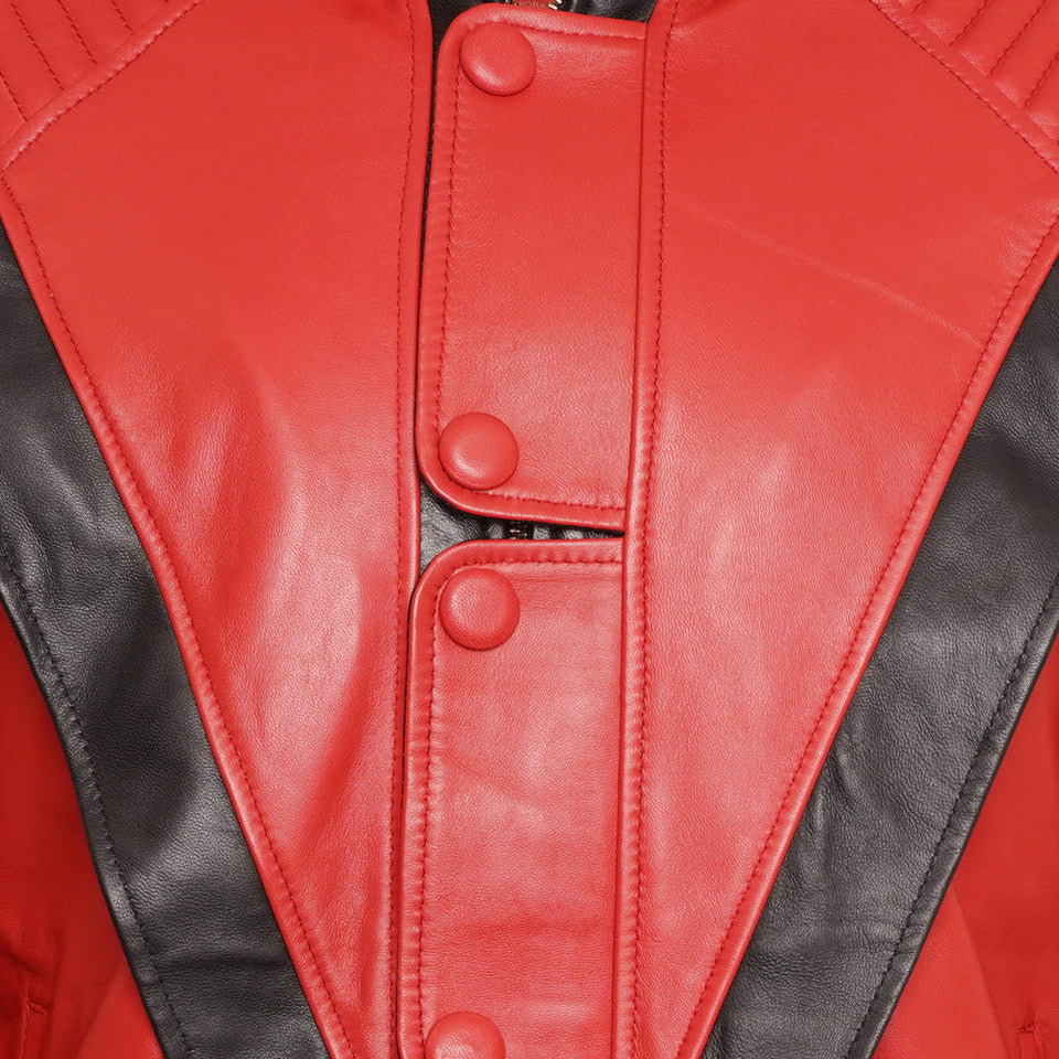 Handmade 80s-inspired Michael Jackson red leather jacket for men. Close up showing the buttons and texture of the leather