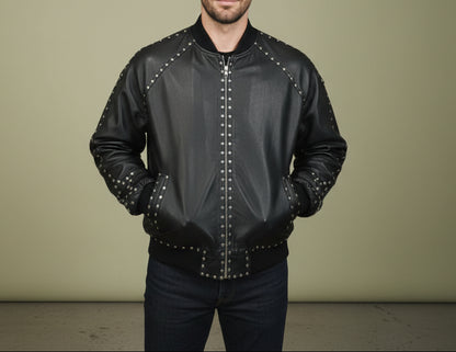 Black leather jacket with studded details on a beige background