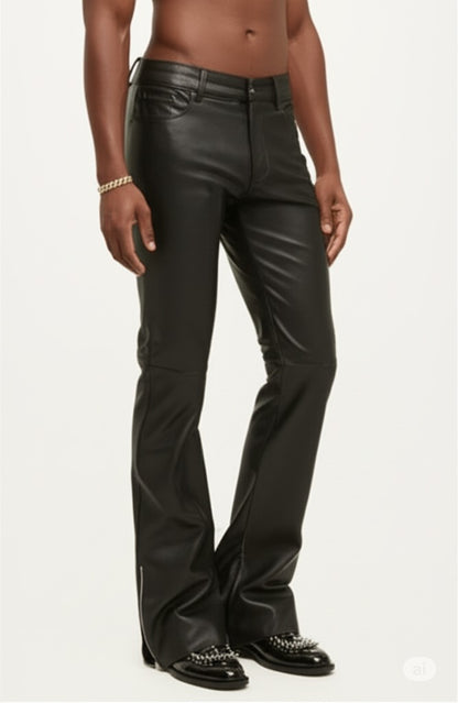 Person wearing black leather pants on a white background