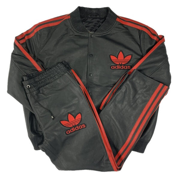 black leather tracksuit with red stripes and Adidas logo on a white background