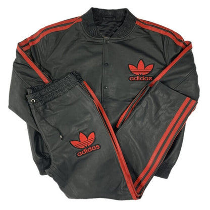 black leather tracksuit with red stripes and Adidas logo on a white background