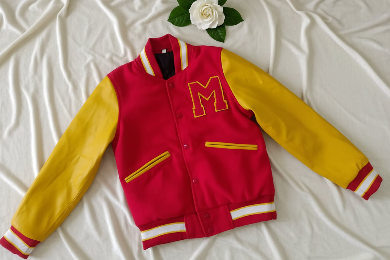 Red and yellow jacket with number 3 on a textured surface