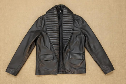 flatlay of Michael Jackson Billie jean Jacket on a beige textured background
