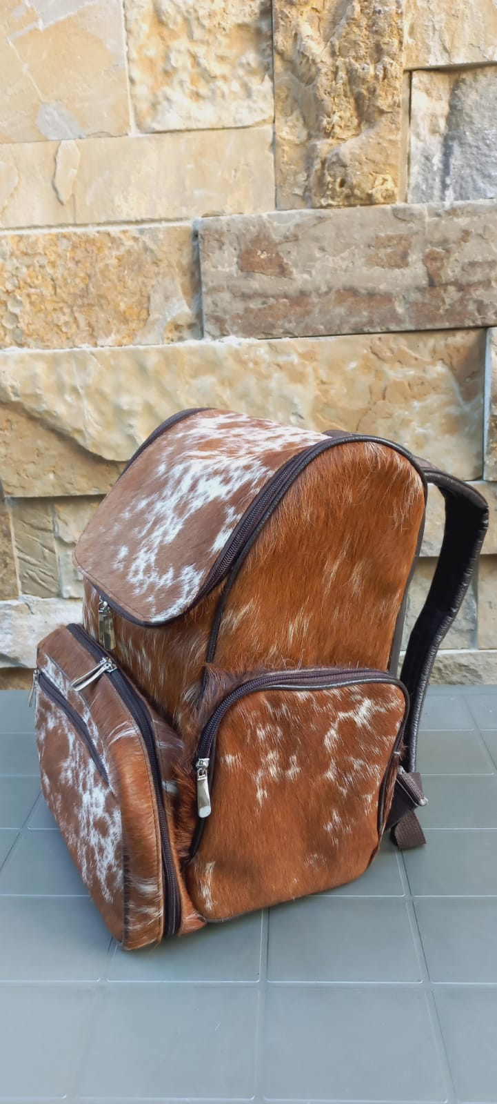 Exotic cowhide brown backpack